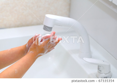 Wash hands children's hands 67335354