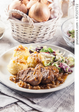 Braised pork loins with onion sauce Braised pork loins with onion sauce 67337722
