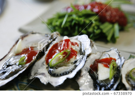 Fresh raw oysters and seasoning sauce, Fresh raw oysters and seasoning sauce, 67338970