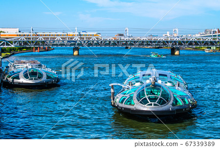 Tokyo cityscape of Japan Overlooking the water bus, Himiko, firefly, limited express etc. (in the back is the new famous place, Sumida River Walk) 67339389
