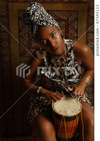 Cute African American Black Woman with tambourine 67343113