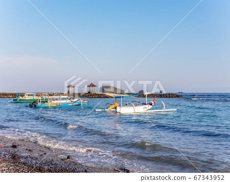 View of boat on Candidasa beach in Bali 67343952