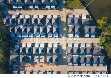 Housing estate and construction work in aerial 67344831