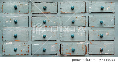 Old blue wooden cabinet with drawers 67345053