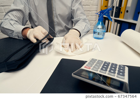 concept of cleaning or disinfecting the office 67347564