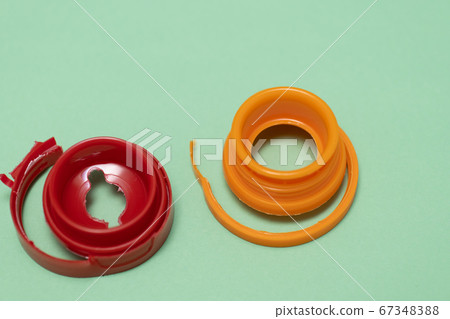 Plastic lid removed from container Plastic lid removed from container 67348388