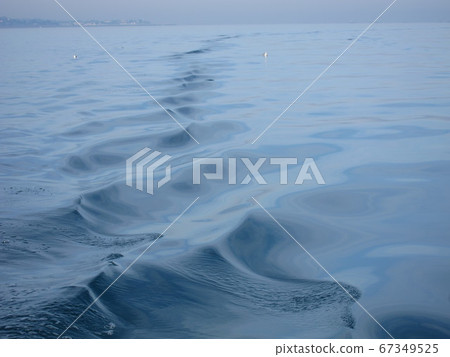 Sea in background with small ripples Sea in background with small ripples 67349525