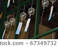 Blue wind chimes fluttering in the summer season 67349732