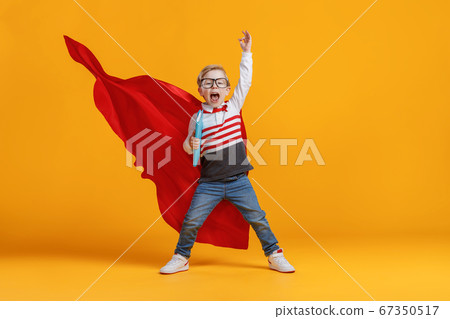 Excited superhero ready for studies. 67350517