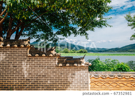 Korean traditional stone wall with river and mountain at Dumulmeori in Yangpyeong, Korea Korean traditional stone wall with river and mountain at Dumulmeori in Yangpyeong, Korea 67352981