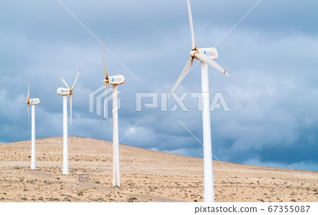 Electric wind turbine generators in the desert 67355087