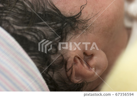 Right ear of the newborn immediately after birth Right ear of the newborn immediately after birth 67356594