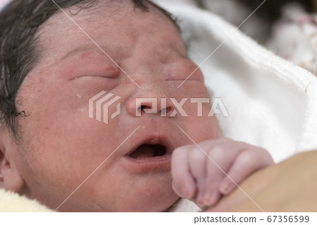 Newborn baby just after birth crying Newborn baby just after birth crying 67356599