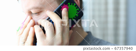 Man speaks on phone infected with coronavirus Man speaks on phone infected with coronavirus 67357940