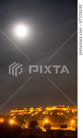 Landscape with World Heritage Walls and Full Moon in Jaisalmer, Rajasthan, India 67358248
