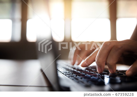 Young Woman Typing Computer Laptop Keyboard. 67359228