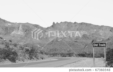 Ghost Town of Old Trails Sign on Route 66 in the Sonoran Desert, Arizona USA in Black and White Ghost Town of Old Trails Sign on Route 66 in the Sonoran Desert, Arizona USA in Black and White 67360348
