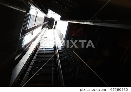Scenery looking up from inside the elevator Scenery looking up from inside the elevator 67360380