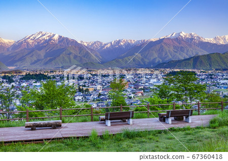 Omachi city and Asahi bathed Northern Alps at Omachi Mountain Museum in Omachi City, Nagano Prefecture 67360418