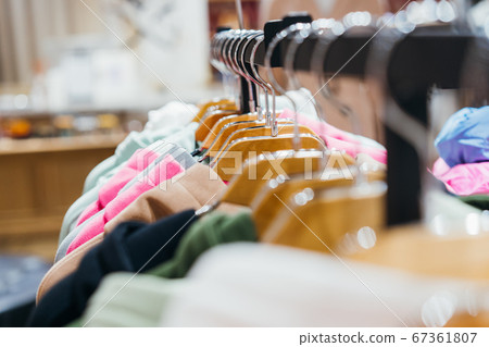 fashion clothing on hangers at the show fashion clothing on hangers at the show 67361807