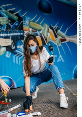 Young woman sorting garbage. Concept of recycling. Zero waste 67361857