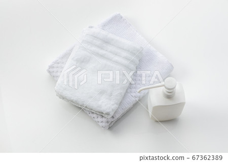 Pump with white towel and disinfectant / disinfection image 67362389