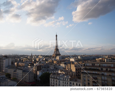 Paris skyline with pleasant clouds and Eiffel Tower 67365810