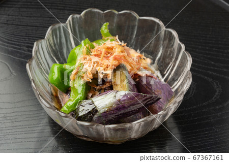 Deep fried eggplant and Manganji peppers 67367161