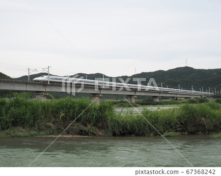 Sanyo Shinkansen N700 Series Shinkansen Nozomi across the Chikusa River Bridge Sanyo Shinkansen N700 Series Shinkansen Nozomi across the Chikusa River Bridge 67368242
