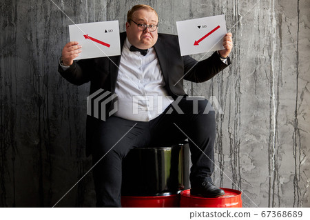fat oil businessman is in desperate 67368689