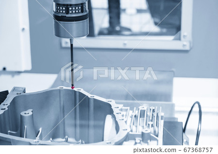 The CMM machine measuring the aluminium casting part. The CMM machine measuring the aluminium casting part. 67368757