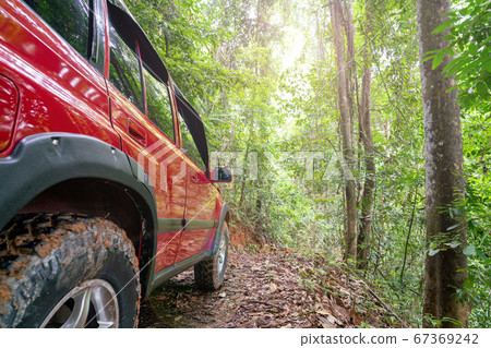 Red suv summer car and road in mountains Driving Red suv summer car and road in mountains Driving 67369242