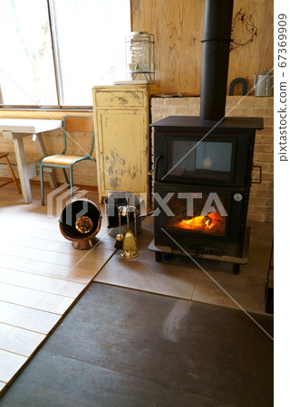 House with wood stove House with wood stove 67369909