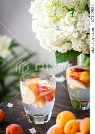 Drink with apricots and peaches Drink with apricots and peaches 67369929