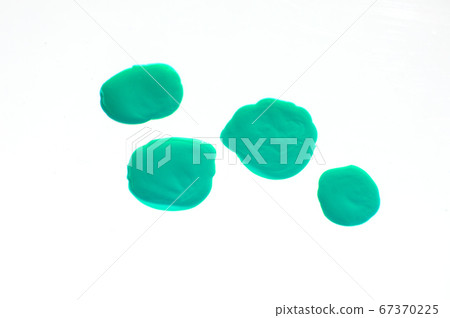 Four drops of nail Polish isolated on a white 67370225