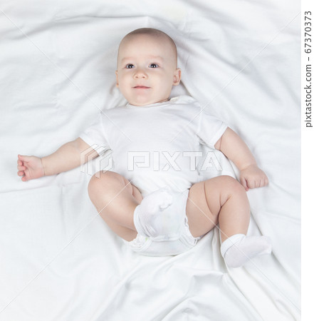 Image of a six month old baby boy 67370373