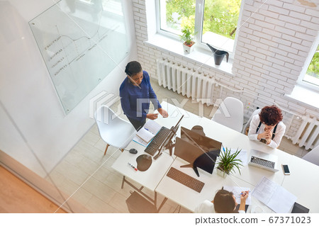 Above view on foreign business team Above view on foreign business team 67371023