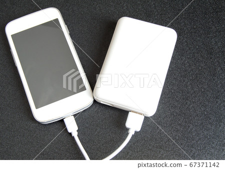 A white phone with a black screen and a copy of A white phone with a black screen and a copy of 67371142