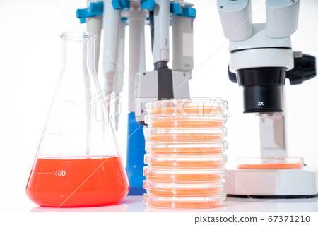 microscope, petri dishes and pipette stand by microscope, petri dishes and pipette stand by 67371210