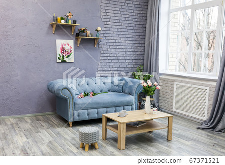 Spacious cozy grey living room with gray laminate 67371521