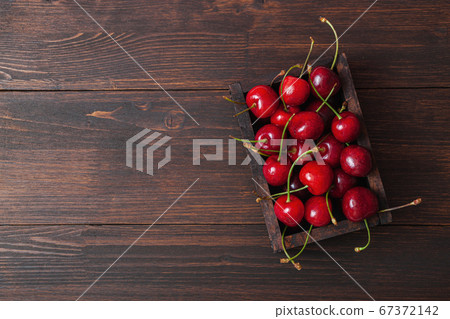Cherry with leaf on plate and water dropsand on Cherry with leaf on plate and water dropsand on 67372142