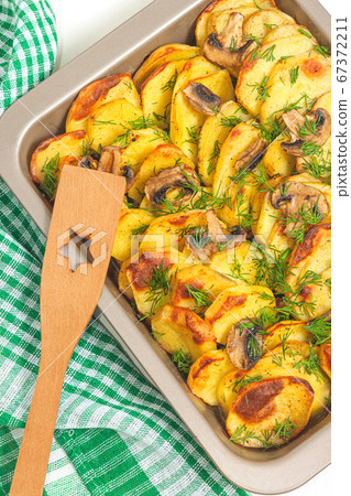 Potato wedges baked with mushrooms, herb oven 67372211