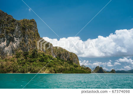 Amazing landscape of Lagen rocky island from sea, El Nido, Philippines Amazing landscape of Lagen rocky island from sea, El Nido, Philippines 67374098