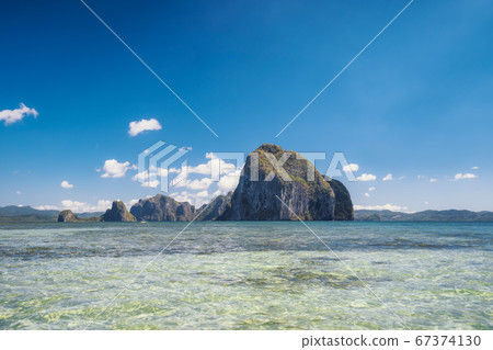 Panoramic view of impressive Pinagbuyutan island located in El Nido Palawan, Bacuit archipelago, Philippines Panoramic view of impressive Pinagbuyutan island located in El Nido Palawan, Bacuit archipelago, Philippines 67374130