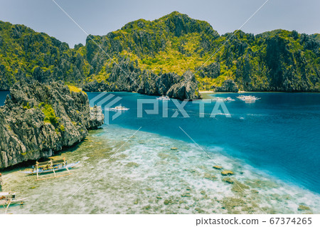 Aerial view of Miniloc island from Shimizu . Crystal clear sea. Bacuit Bay, El Nido, Palawan, Philippines Aerial view of Miniloc island from Shimizu . Crystal clear sea. Bacuit Bay, El Nido, Palawan, Philippines 67374265