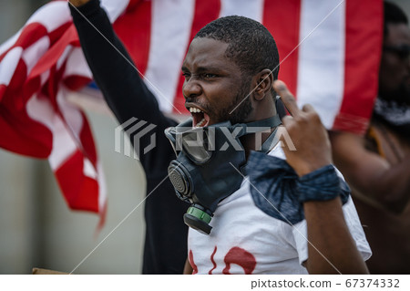 afroamerican people rioting due to racial discrimination 67374332
