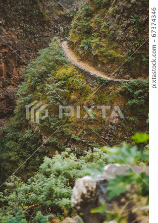 Hiking trail in mountains on island of Santo Antao, Cape Verde, Africa 67374346