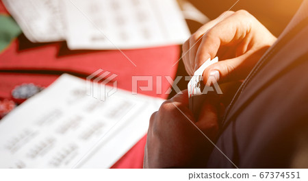 colorful lifestyle Ace of hearts and black jack with poker chips in the background. 67374551