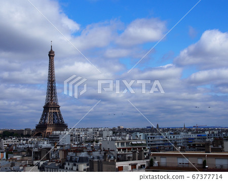 Paris skyline with its impressive Eiffel Tower under the clear blue sky Paris skyline with its impressive Eiffel Tower under the clear blue sky 67377714