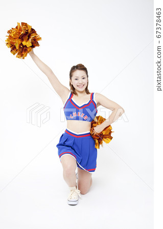 Cheerleader cheering with a smile 67378463